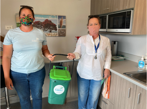 Office lunch scraps into compost